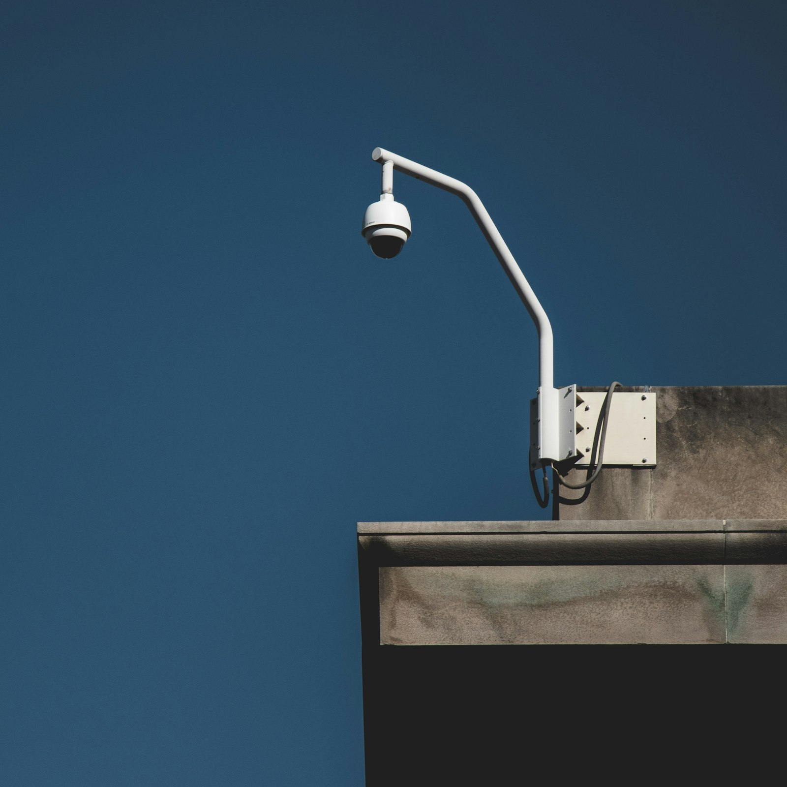 Commercial security camera mounted on a building exterior